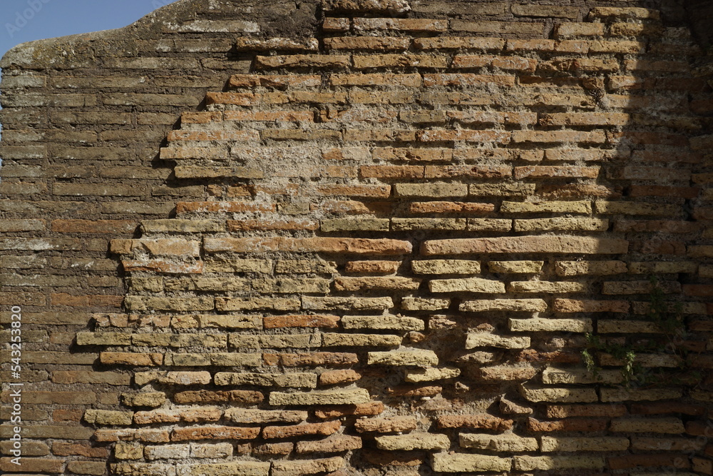 Detail of a wall in Roman structure made of bricks and with the opus ...