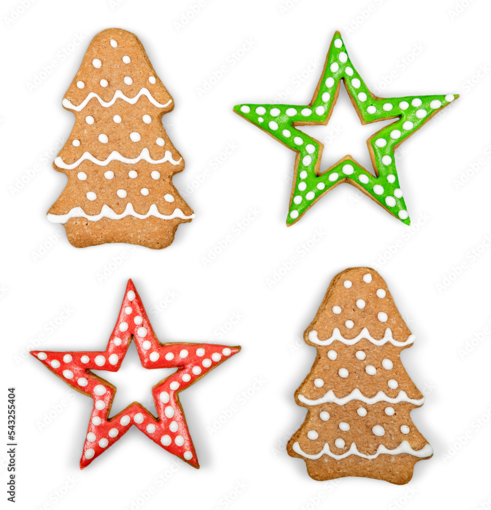 Christmas Ginger and Honey cookies on isolated white background. Star, fir tree, snowflake shape Christmas Ginger and Honey cookies on isolated white background. Star, fir tree, snowflake shape