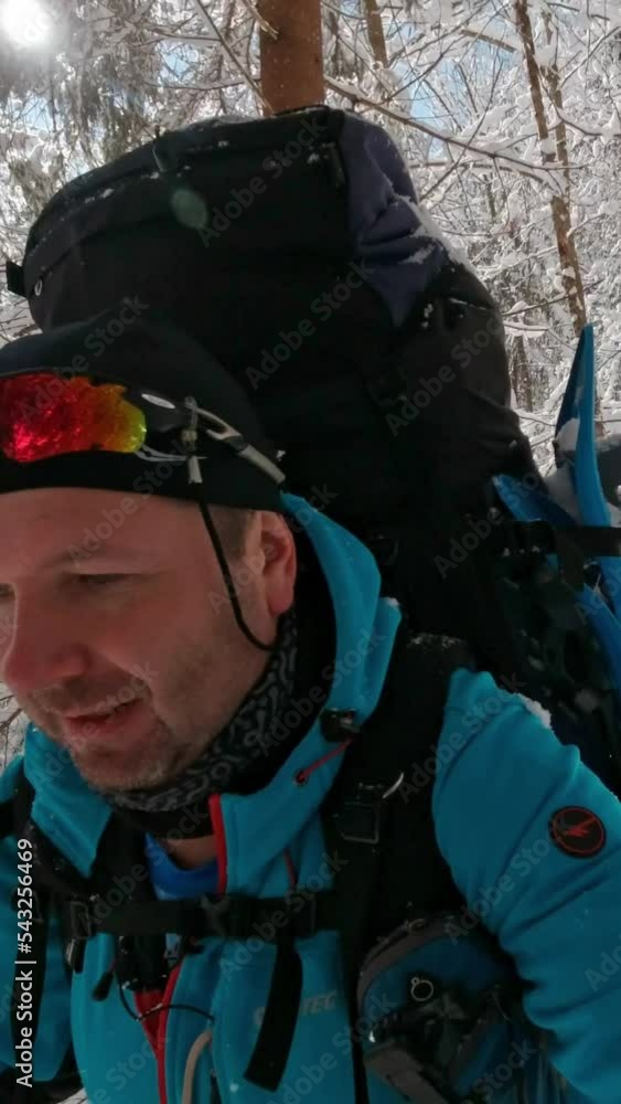 Man Films Himself During A Hike Through The Winter Woods. Vertical Video. Man Films Himself During A Hike Through The Winter Woods. Vertical Video.