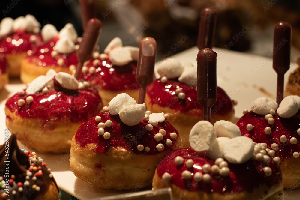 Decorative donuts in a Jerusalem bakery during the celebration of the Jewish holiday of Hanukkah, when it is traditional to eat foods fried in oil.