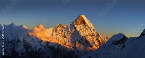 Sacred mount Machapuchare at sunset. Himalaya mountains, Nepal. © Anna