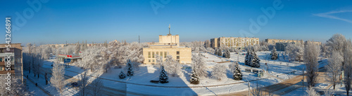 Rubizhne city, Luhansk reg. Ukraine-December,2021. Town Square on a frosty sunny winter day. View of the House of Culture and the building of the city executive committee. photo
