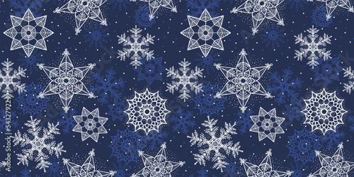 Whimsical blue and white Christmas snowflake pattern. Snow vector illustration perfect for Christmas card decor or any celebration design materials.