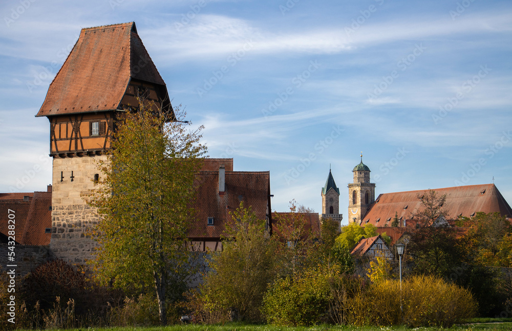 View of the town of Dinkelsbühl on the romantic road in Bavaria, with half-timbered houses, towers, churches, and a medieval wall