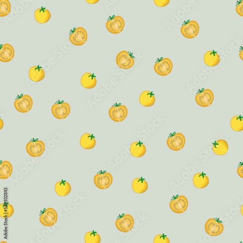 Fototapeta Naklejka Na Ścianę i Meble -  seamless pattern with yellow tomatoes on gray background, trendy pattern of whole and half tomatoes for kitchen design