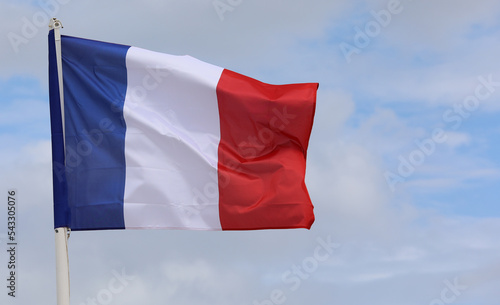 large French flag flying in Paris European capital