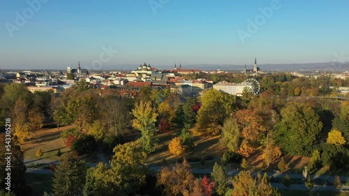 Park autumn magic drone aerial Historical city Olomouc, shot view panorama tree leaves color tower Gothic church Moritz Ferris wheel city town hall Olomouc Gothic building Saint Wenceslas Cathedral photo