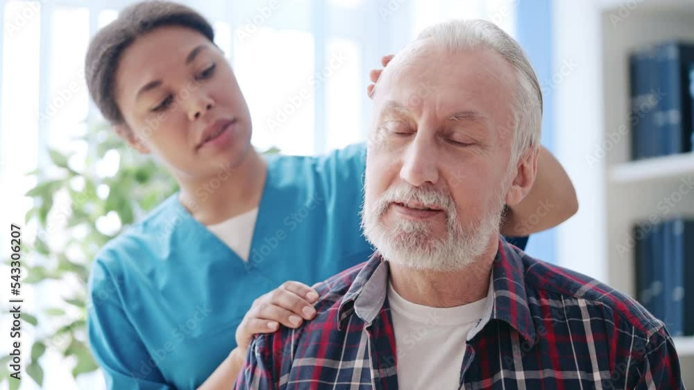 custom made wallpaper toronto digitalFemale certified traumatologist checking neck of her mature male patient, health