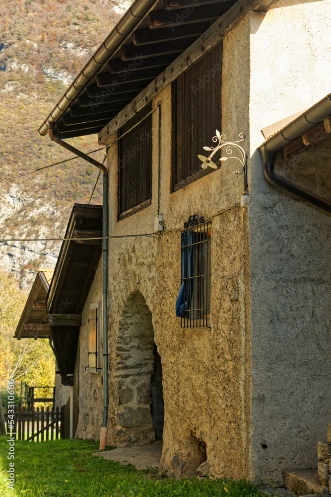 Irone, medieval Alpine village in Trentino, Italy, a touristic destination seen on a sunny autumn day