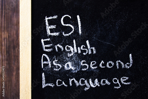 Esl - English As A Second Language text concept on chalk board. photo