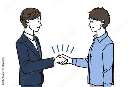 契約成立後握手する男性