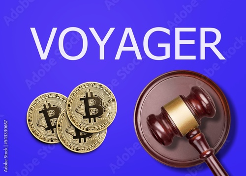 Judge's gavel and crypto coins in front and Voyager Digital Ltd company logo