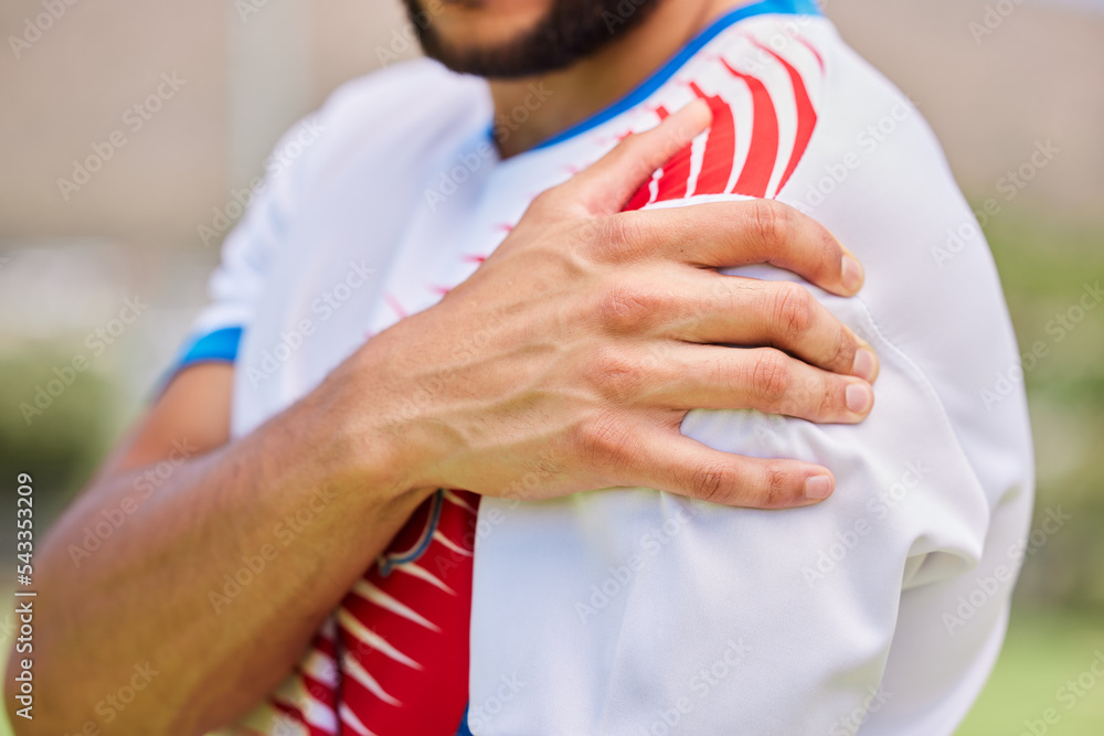 Sports, soccer and hands of man with shoulder pain from training game