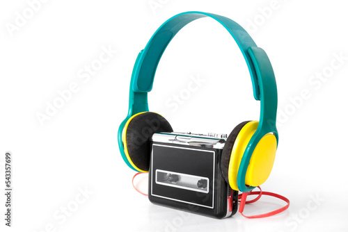 portable cassette walkman from the 90s with headphones, on isolated white background