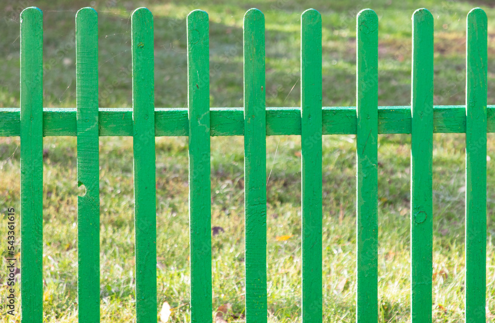 Wooden fence painted with green paint Wooden fence painted with green paint