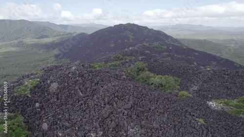 Black Mountain (Kalkajaka) National Park At Daytime In Shire of Cook, North Queensland, Australia. - aerial pullback photo