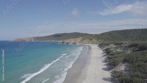 Sea Waves Coming To The Shoreline Of Wreck Beach - Snorkeling Spot In Great Keppel Island, QLD, Australia. - aerial photo