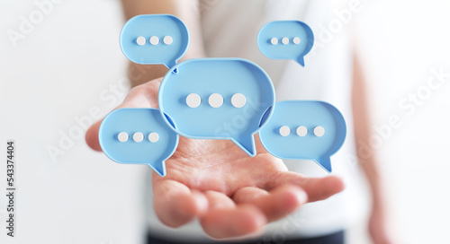 Wallpaper Mural Businessman using digital speech bubbles talk icons. Minimal conversation or social media messages floating over user hand. 3D rendering Torontodigital.ca