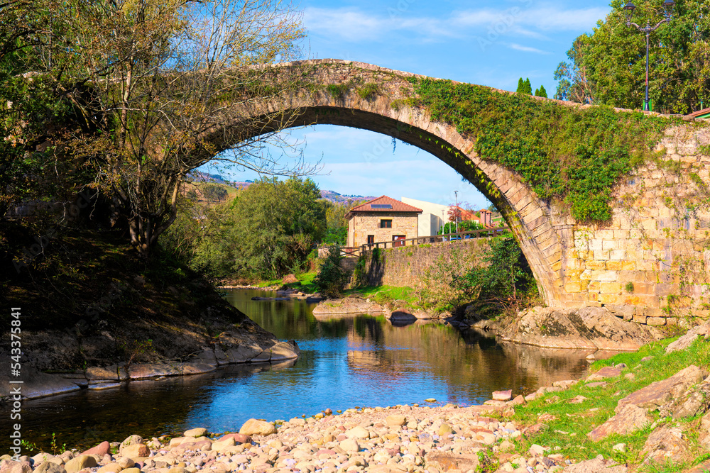 Lierganes Cantabria Spain ancient roman bridge over River Miera in pretty village located 15 miles from Santander