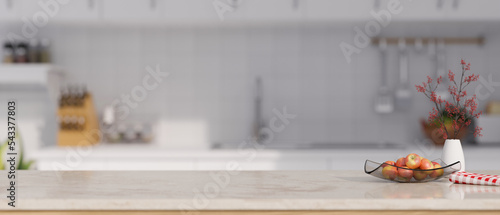 Fotografiet Marble white kitchen tabletop with apple tray, ceramic vase, napkin and copy spa