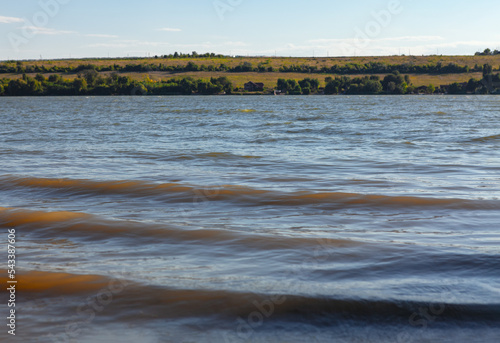 River waves , windy weather , wavy water surface