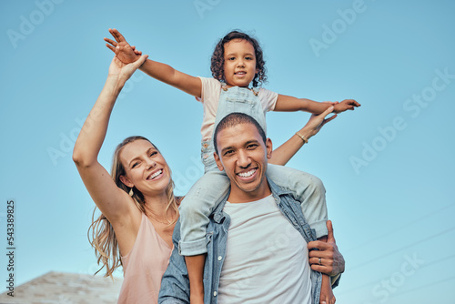 Family  play and smile with quality time in nature with a mother  dad and girl with happiness. Portrait of a happy father  mom and child together with love and interracial parent care for a kid