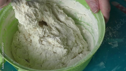 the cook kneads the dough for pies. healthy food concept