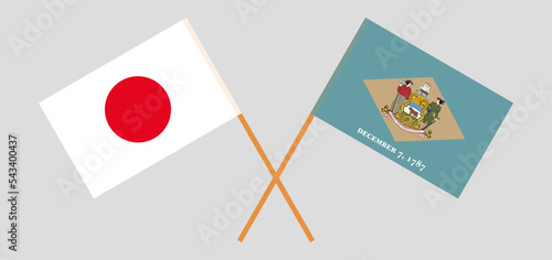 Crossed flags of Japan and The State of Delaware. Official colors. Correct proportion