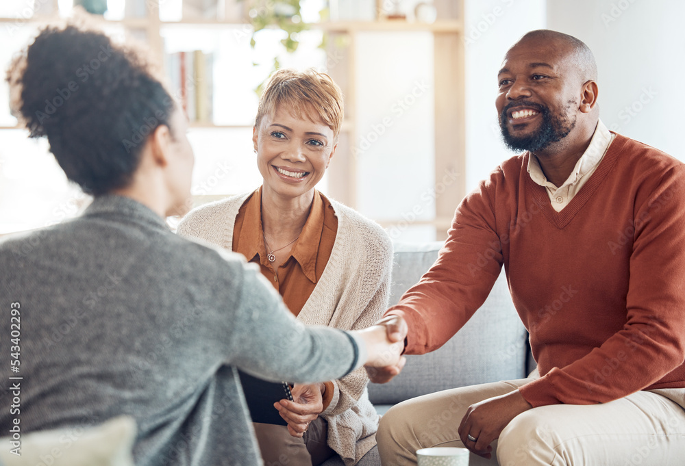 Obraz premium Black couple, financial advisor and handshake on home sofa for discussion with broker and shaking hands for agreement, contract and deal. Happy man and woman talking to agent for insurance or loan