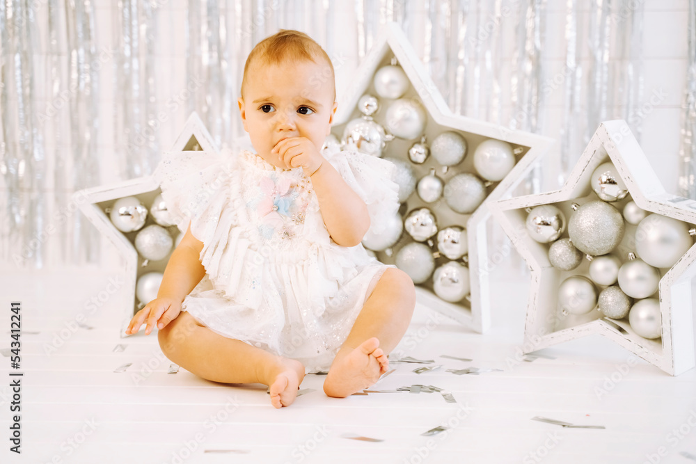 Portrait of a baby Little kid enjoy the holiday. New Year. Portrait of a baby Little kid enjoy the holiday. New Year.