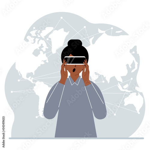 The concept of augmented or extended reality. Woman wearing 3D glasses or virtual reality headset. On the background of the world map.