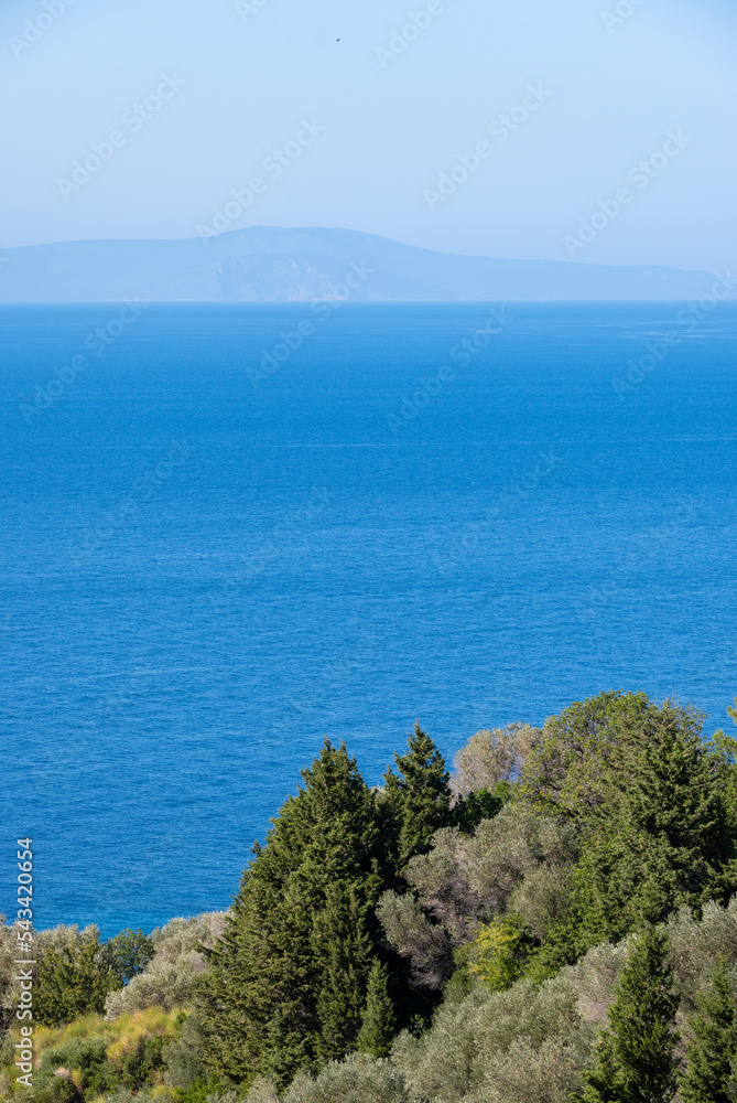 Aerial view of turquoise blue Mediterranean water on the coast of Samos, Greek Aegean Sea