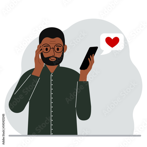 Satisfied man reads a message on his mobile phone. Message with red heart. Vector