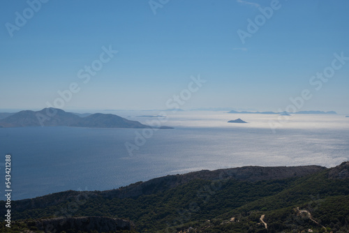 Coast view of Ikaria, Samos and Furnoi islands in a quiet summer morning