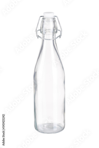 Close-up shot of a clear empty glass bottle with a bugle plug. The glass bottle with a bugle plug is isolated on a white background. Front view.