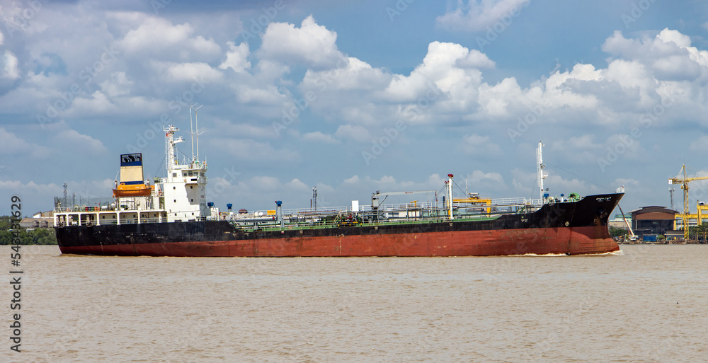 The Oil Products Tanker sails alongside the shore