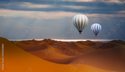 Print op canvas Hot air balloon flying over sand dunes in the Sahara Desert - Orange dunes in th