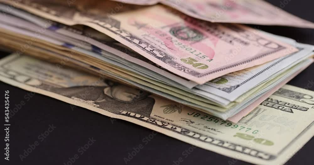 collect American cash dollar bills on black paper, cash paper new American dollars collect American cash dollar bills on black paper, cash paper new American dollars