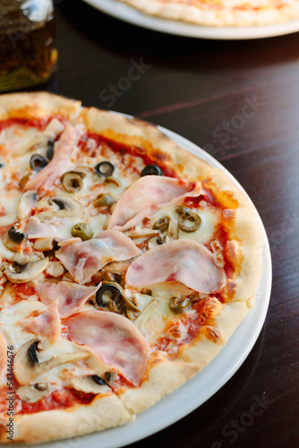 Beautiful pizza with a ham ...