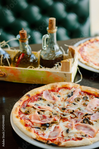 Beautiful pizza with a ham ...