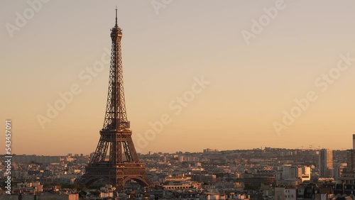 Eiffel tower golden hour during clear sky sunset. Left of Frame. 