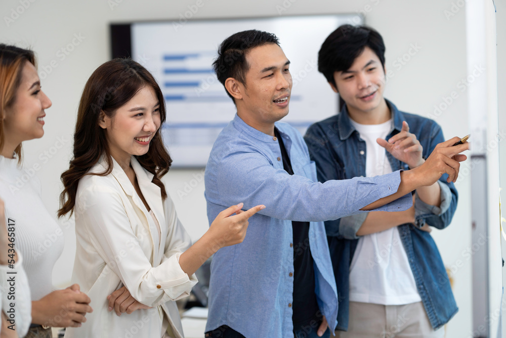 Business people working and brainstorming in office Business people working and brainstorming in office