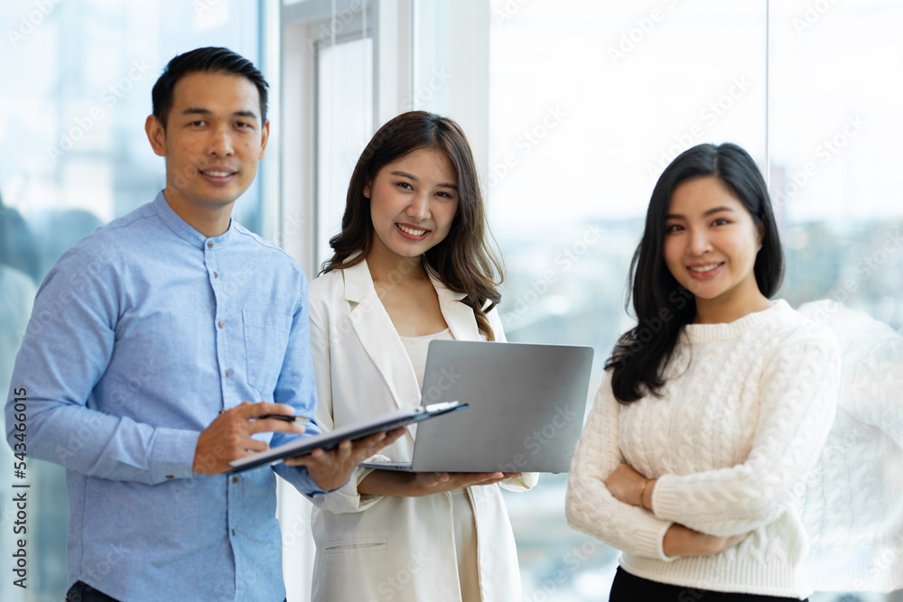 Business people working and brainstorming in office Business people working and brainstorming in office
