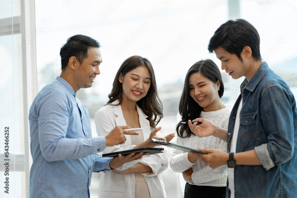 Business people working and brainstorming in office Business people working and brainstorming in office