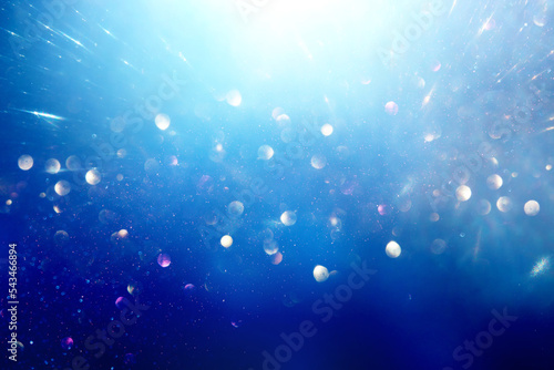 background of abstract bluer and silver glitter lights. defocused