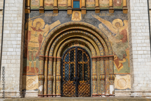 Rich decorated murals at the entrance of the Kremlin's Dormition Cathedral, Moscow, Russia