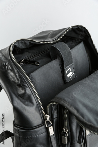 Separate padded laptop pocket in backpack