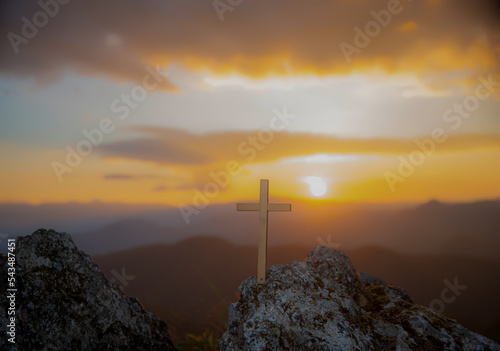 Symbol of God love to people the mountain at sunset photo
