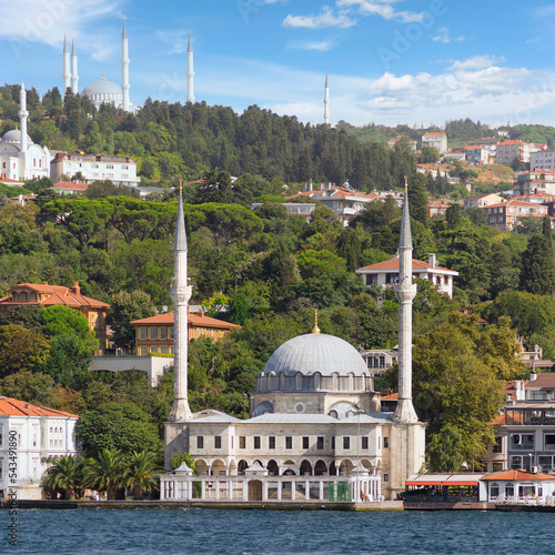 View from Bosphorus Strait overlooking Beylerbeyi Mosque, or Beylerbeyi Camii, aka Hamid i-Evvel Mosque, suited at the waterside of Beylerbeyi district, Istanbul, Turkey