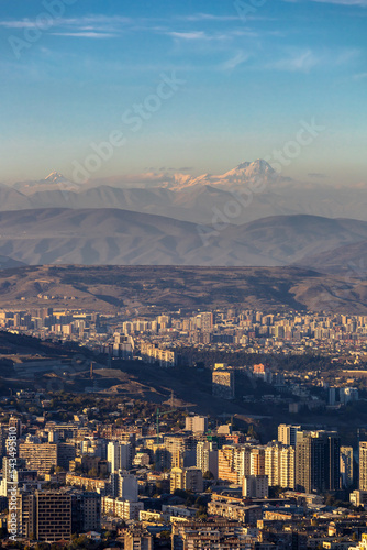 top view of the city of Tbilisi in Georgia and Mount Kazbek on the horizon